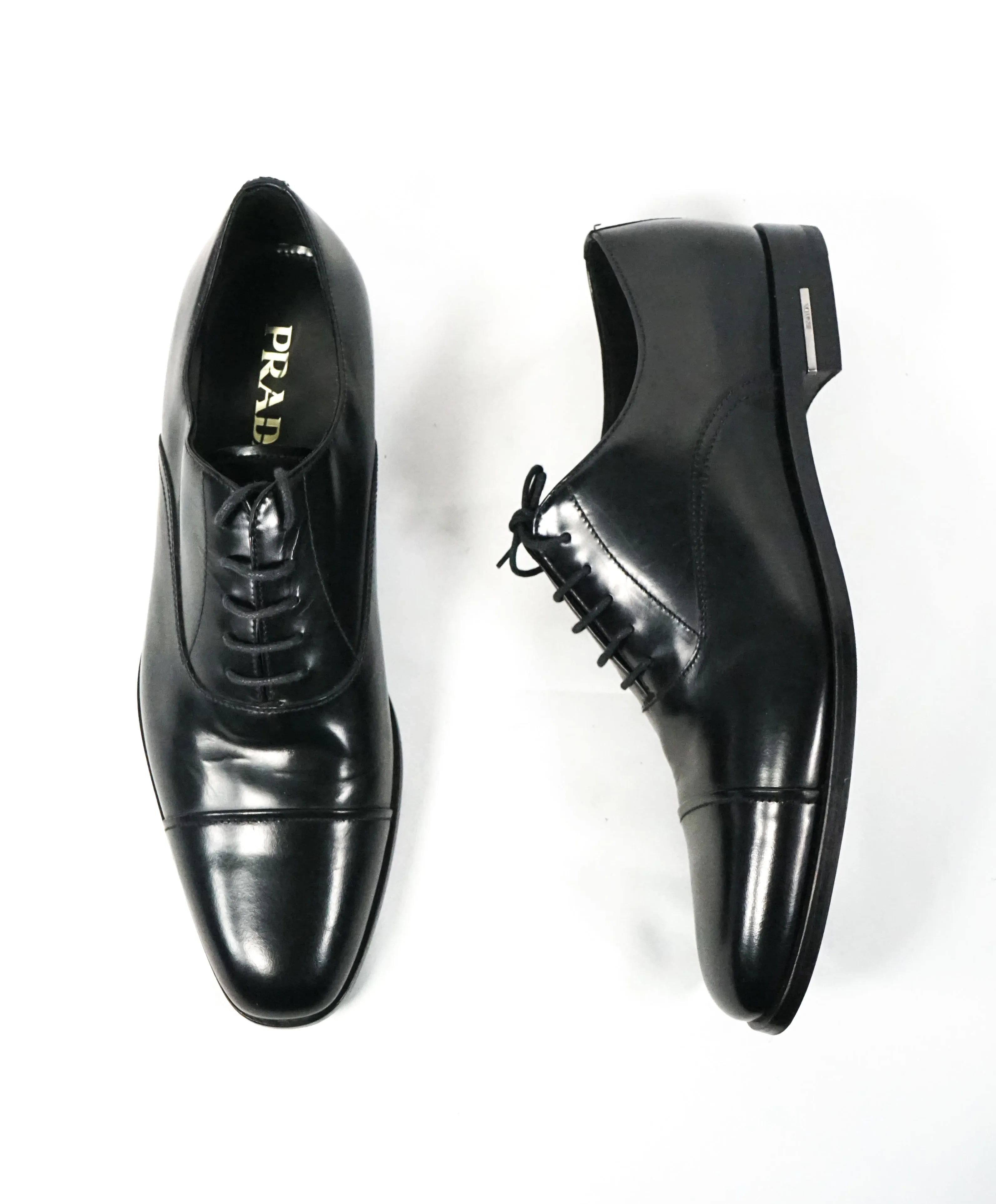 PRADA - Leather Cap Toe Spazzolato Oxfords With Logo Inset Heel - 9